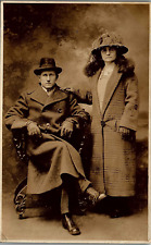 c1900 SOMBER WELL DRESSED COUPLE  UNDIVIDED REAL PHOTO POSTCARD  17-22 picture