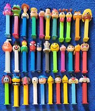 Mixed lot of 32 Pez Dispensers Pre-Owned Unpackaged  picture