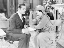 Author Elinor Glyn fixing Antonio Moreno's eye make-up on the - 1925 Old Photo picture
