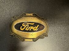 Classic Ford Motor Company Logo Emblem on Vintage 78 Raintree framed belt buckle picture