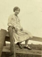 VE Photograph Pretty Woman Posing For Portrait Sitting On Wood Fence Rail 1920's picture