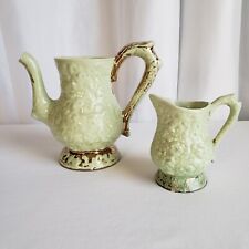 Vintage Green Ceramic Embossed Floral Teapot (missing lid) And Creamer picture