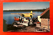 Vintage UNPOSTED Postcard~CANADA~SMALL PLANE SUPPLYING REMOTE NORTHERN COMMUNITY picture