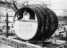 Young woman in her barrel-shaped booth in 1930 Old Historic Photo 1 picture