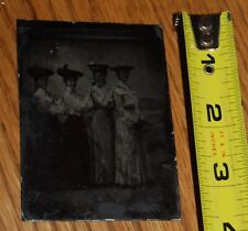 Tintype of 4 women forming a hokie pokie chain picture