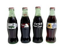 Four Collectible Unopened Coca Cola Bottles Lot Of 4 Different Bottle 8oz picture