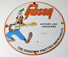 Vintage Gibson Guitars - Acoustic Electric Bass Porcelain Gas Station Goofy Sign picture