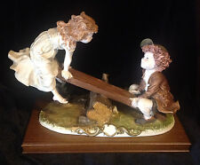 CAPODIMONTE SIGNED GIUSEPPE ARMANI PORCELAIN HAND PAINTED BOY & GIRL ON SEESAW picture