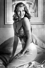 RITA HAYWORTH SEXY ACTRESS SITTING ON BED 4X6 PUBLICITY PHOTO POSTCARD picture