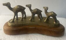 Vintage Brass Camel Family Trio On Solid Wood picture