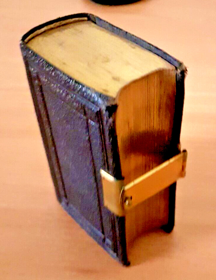 antique miniature book of common prayer, brass clasp.
