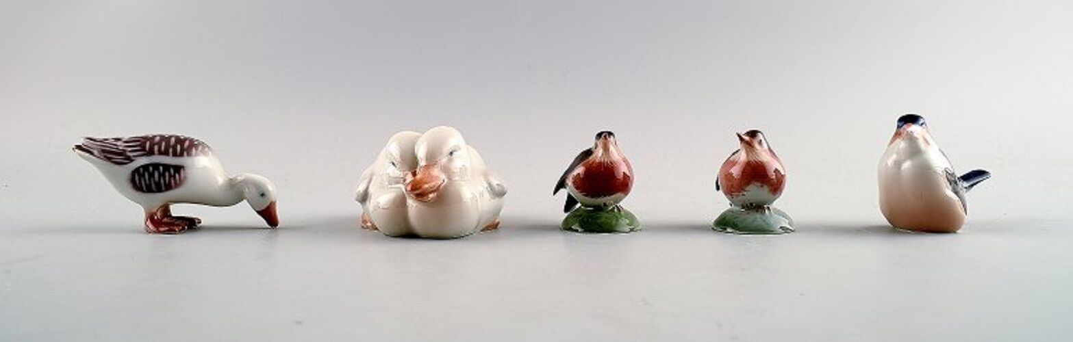 5 Royal Copenhagen and B & G, Bing & Grondahl porcelain figurines.