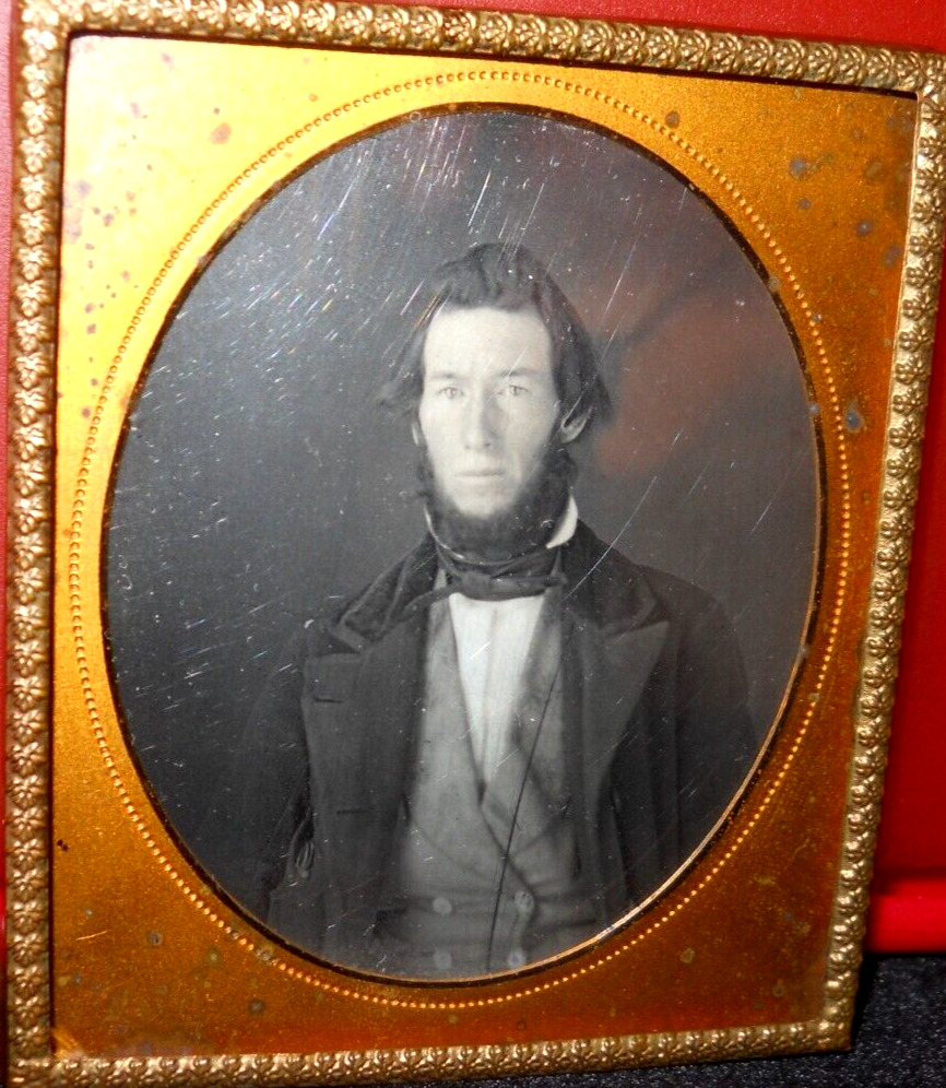 1/6th size Scovill Extra Daguerreotype of young man in brass mat/frame