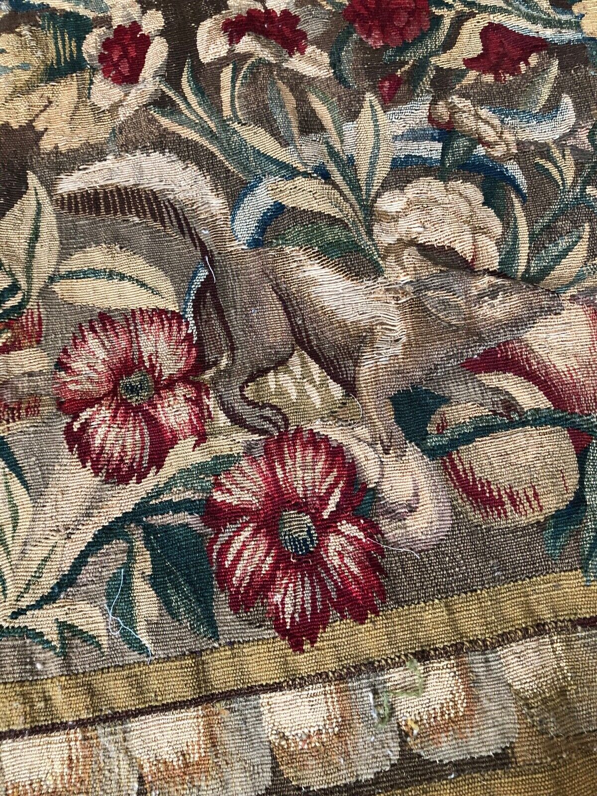 Antique Aubusson tapestry with floral design and squirrel; 2 pieces plus border