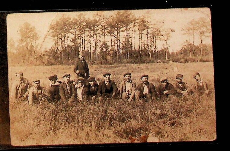 unidentified RPPC Men in a Field post card #59