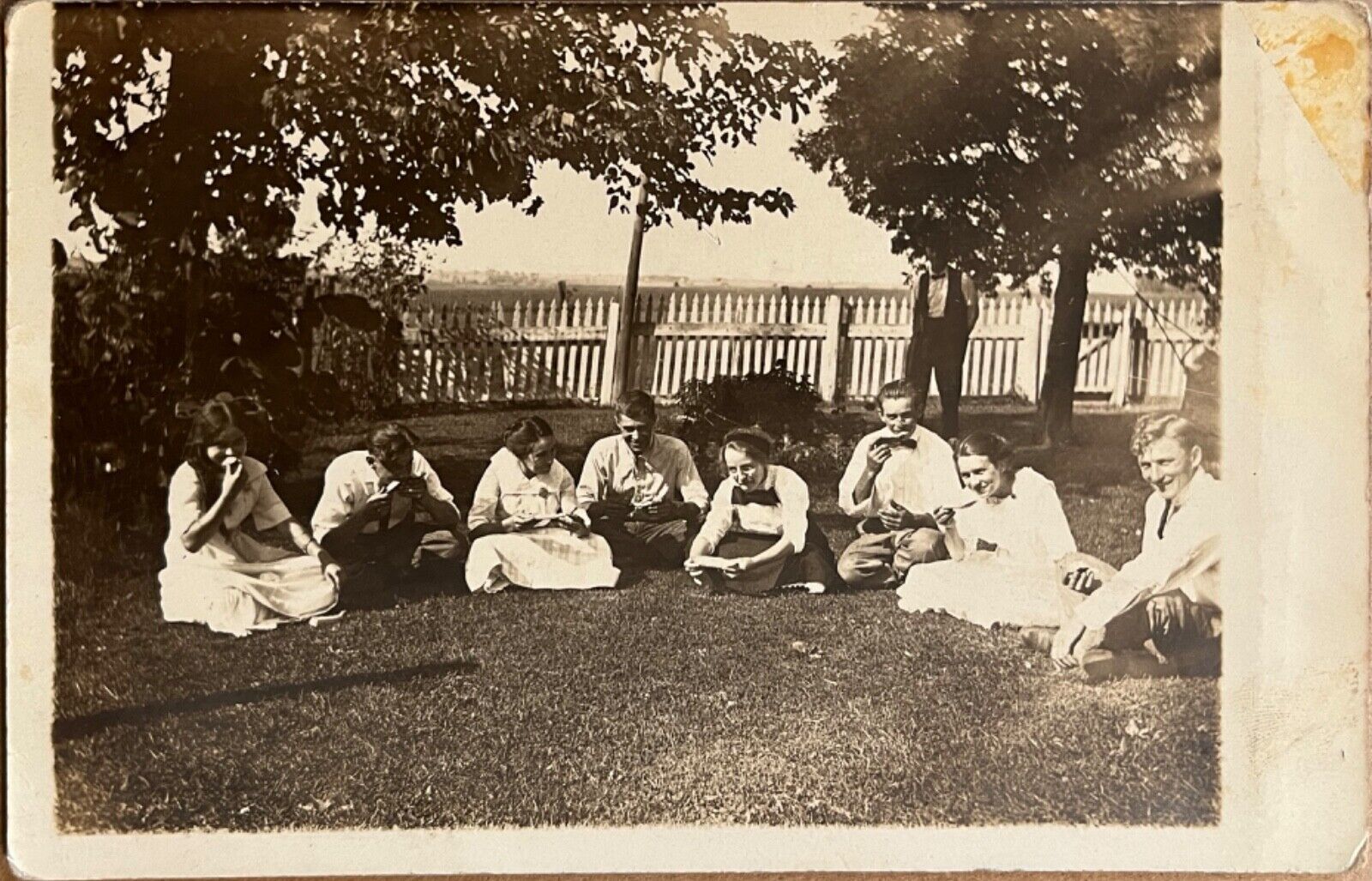 RPPC Young People Eating Watermelon Outdoors Antique Real Photo Postcard c1910