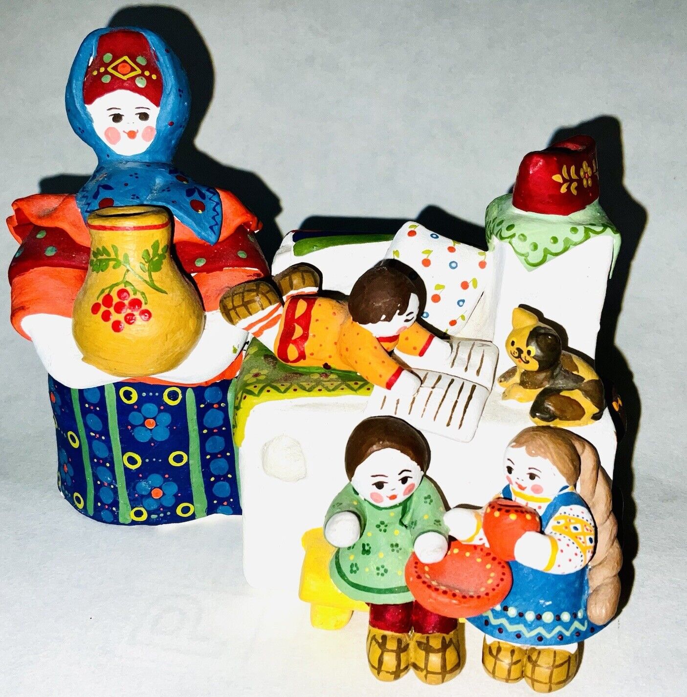 Vintage Russian Clay Sculpture Depicting A Peasant Family Around A Warm Oven