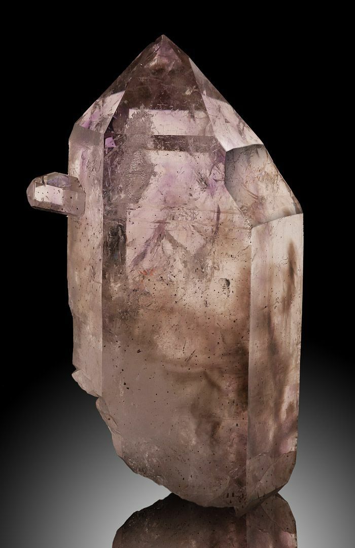This Brandberg Amethyst with Penetrator crystal has smokey quartz inclusions