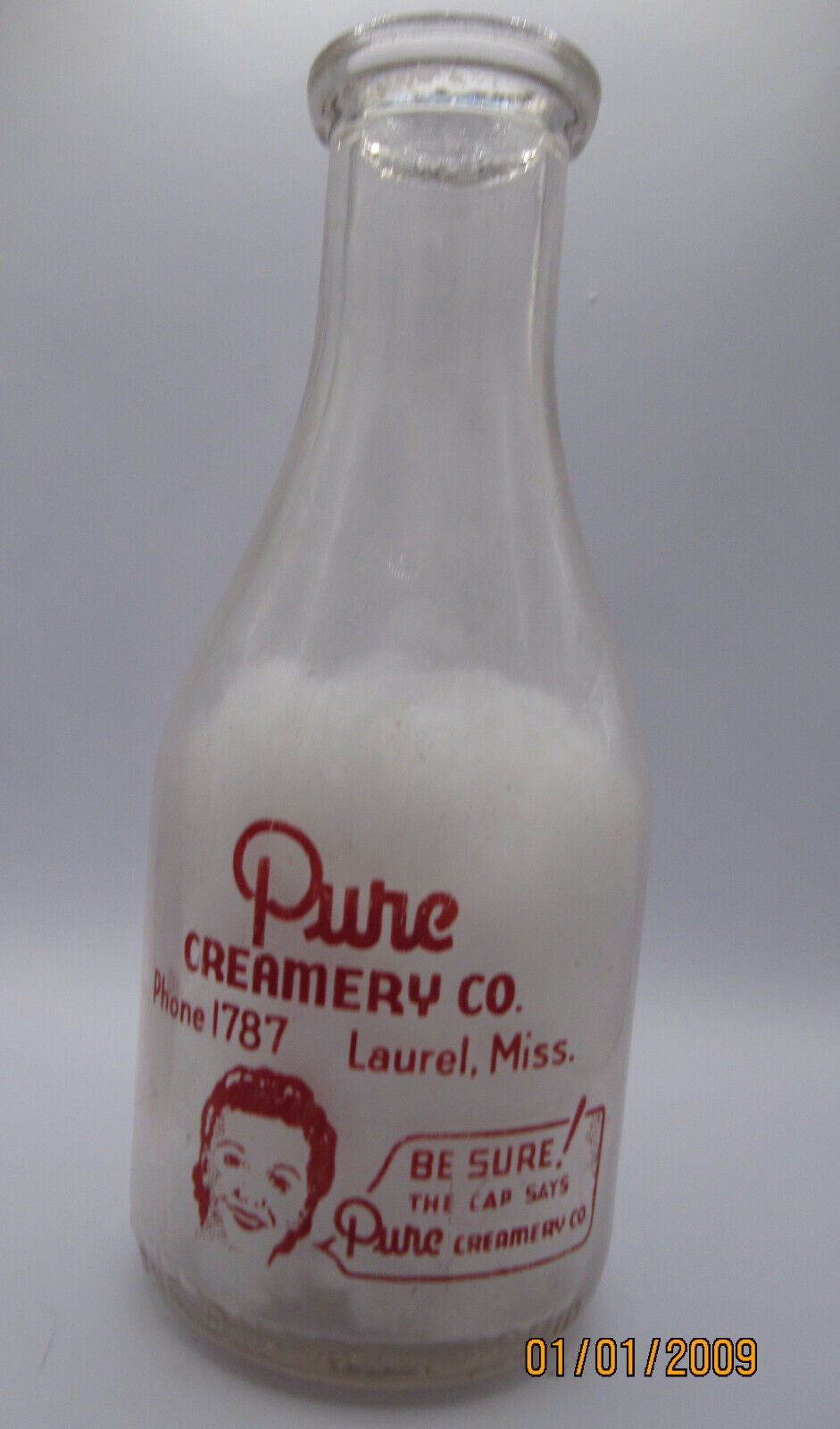 Pure Creamery, Quart Milk Bottle, Red Pyro, Laurel, Mississippi