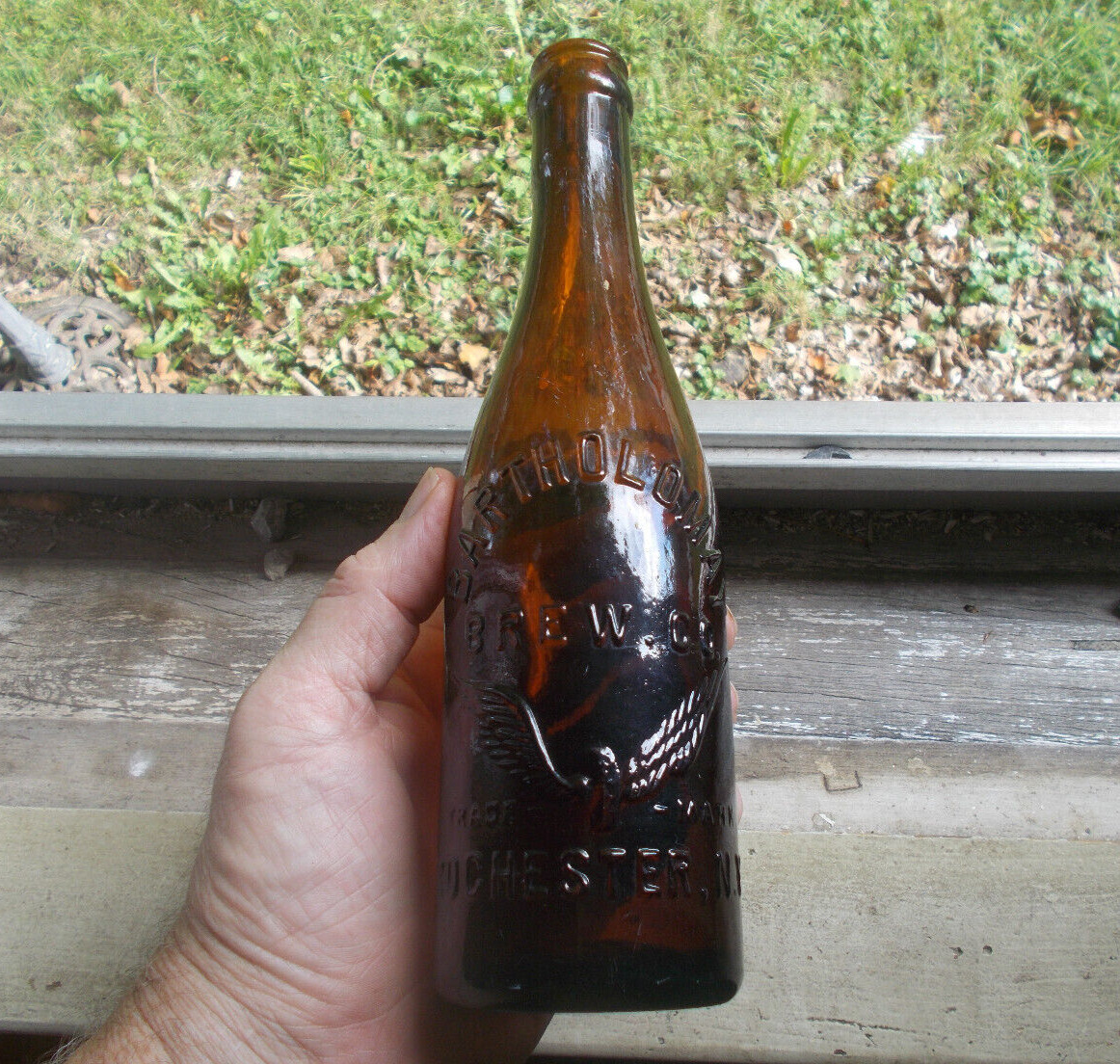 BARTHOLOMAY BREW CO ROCHESTER EMB WINGED WHEEL EARLY 1900 PRE PRO BEER BOTTLE