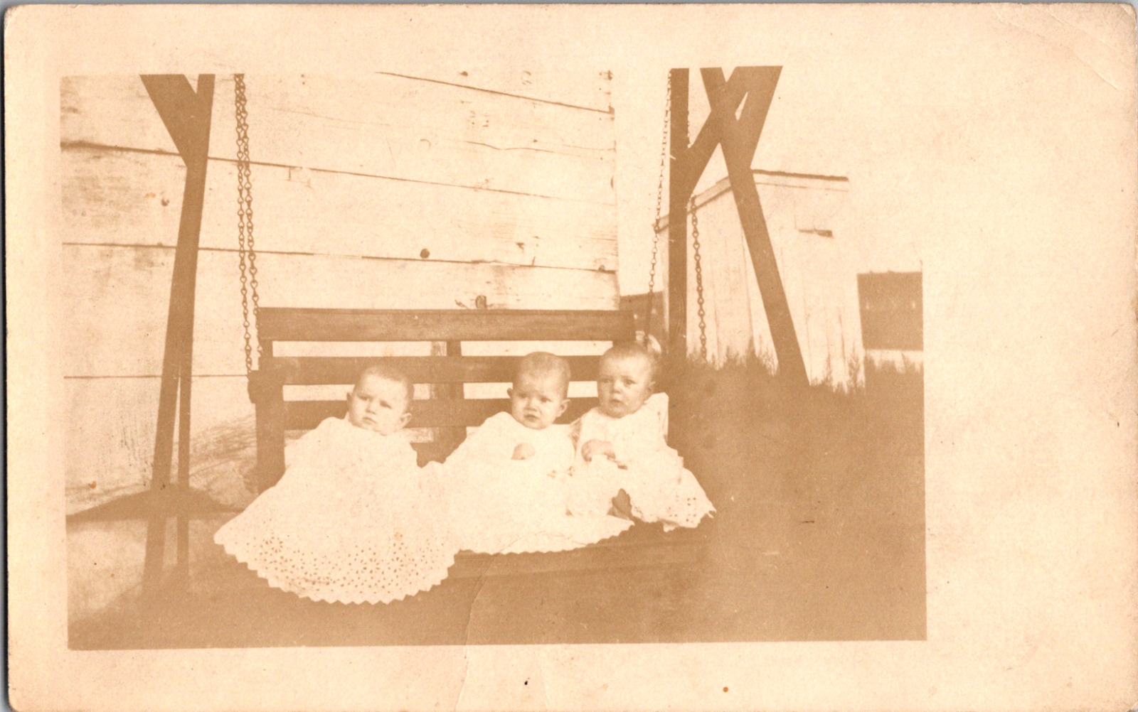 Vintage C. 1907 RPPC Triplets Toddlers Babies Sit Porch Swing Outhouse Postcard