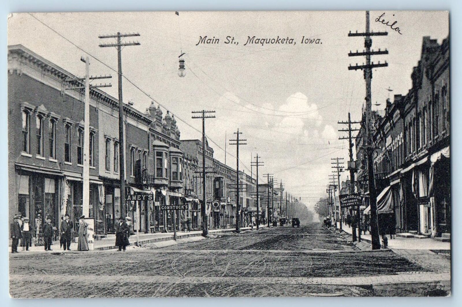 1908 Main Street Dirt Road Business Section Electric Post Maquoketa Iowa Postcar