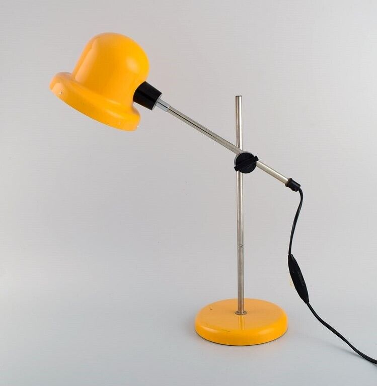 Swedish designer. Adjustable retro desk lamp, yellow lacquered metal and chrome