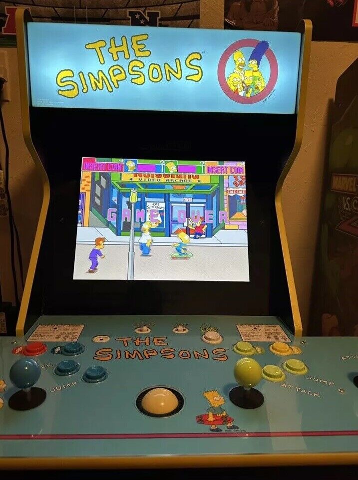 Arcade1Up The Simpsons 4-Player Arcade Cabinet with Riser & Tin Wall Sign.