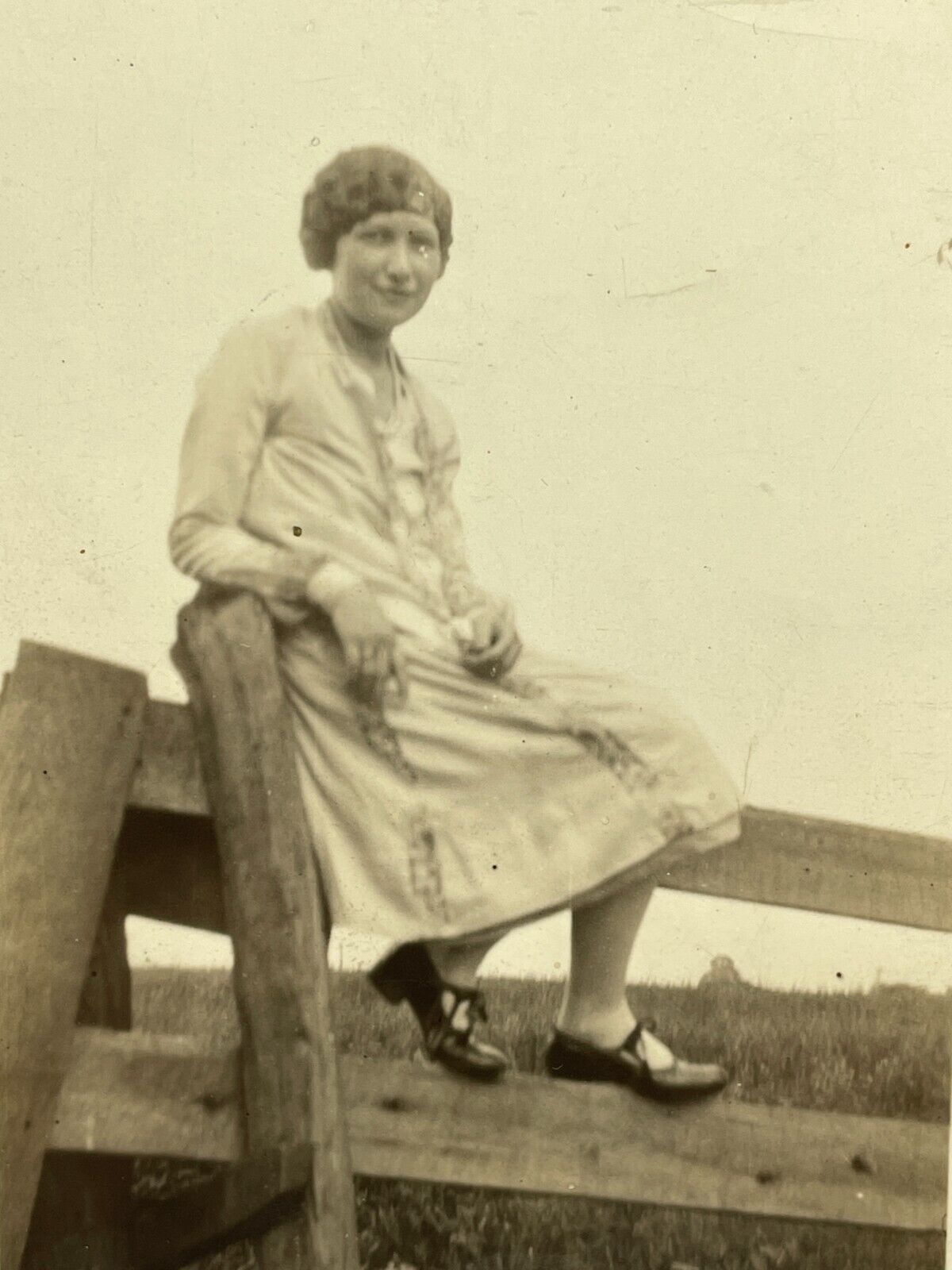 VE Photograph Pretty Woman Posing For Portrait Sitting On Wood Fence Rail 1920's