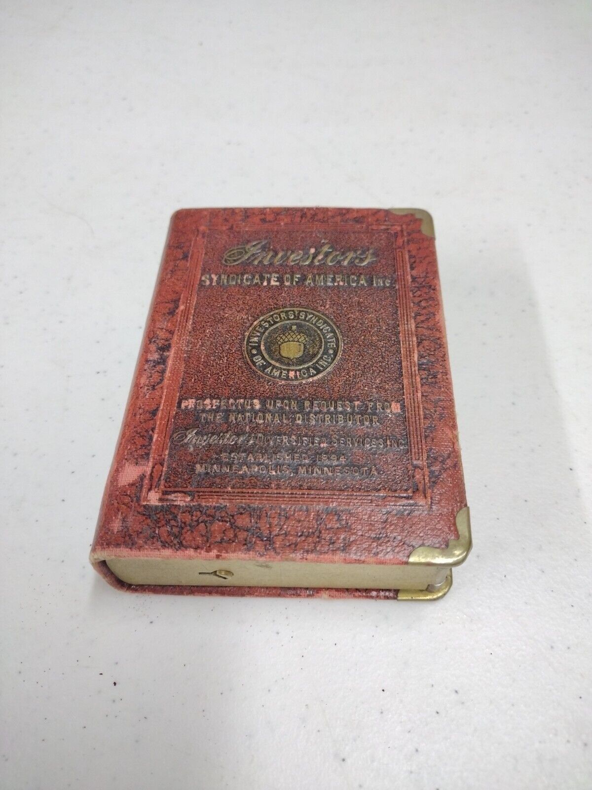 Antique Investor's Syndicate Of America Inc. Advertising Book Coin Bank