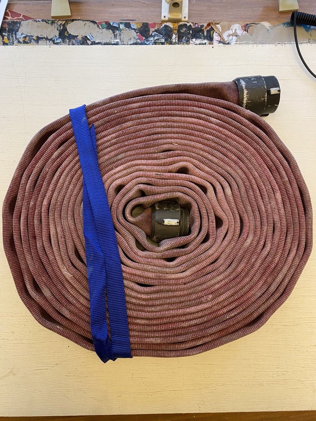 VINTAGE RARE “RED HEAD” RETIRED SEATTLE FIRE DEPT FIREHOSE.