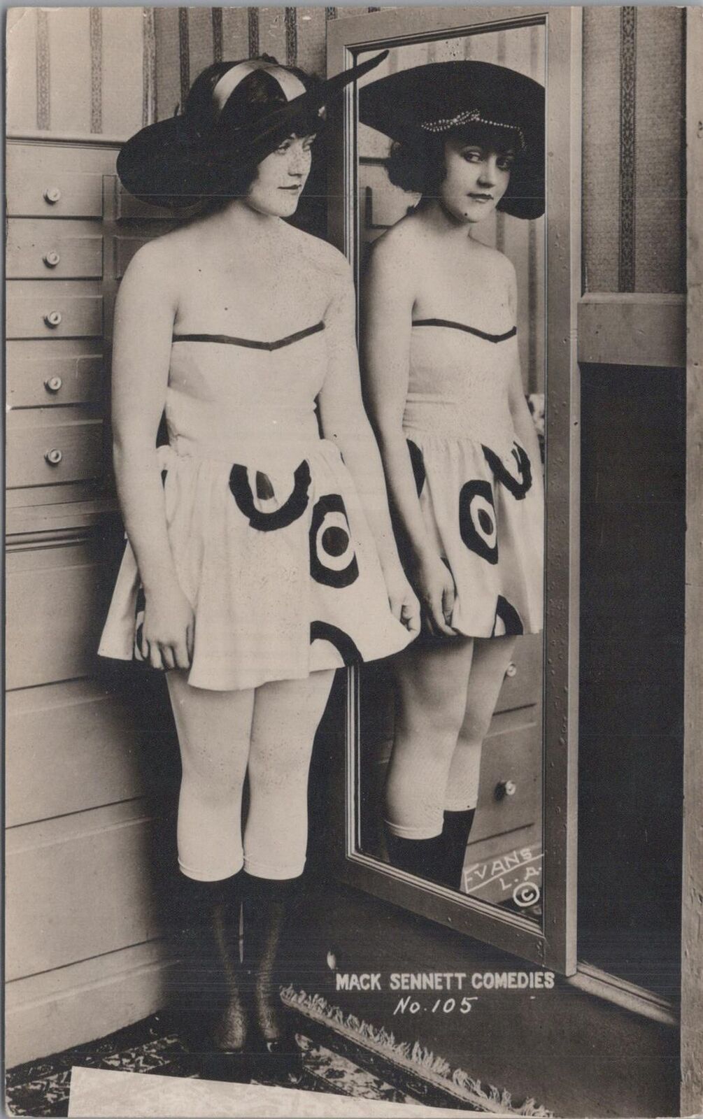 RPPC Postcard Woman Bullseye Dress Looking at Herself in Mirror
