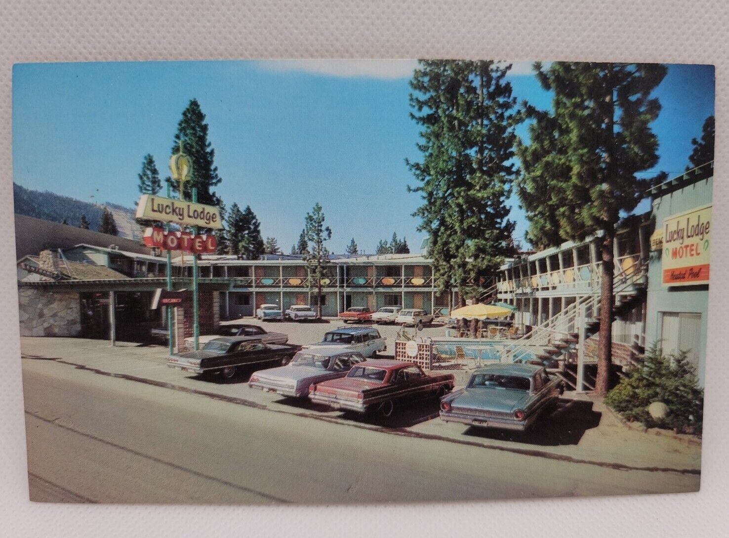 Vintage Postcard Lucky Lodge Motel Lake Tahoe California US 50 Old Cars