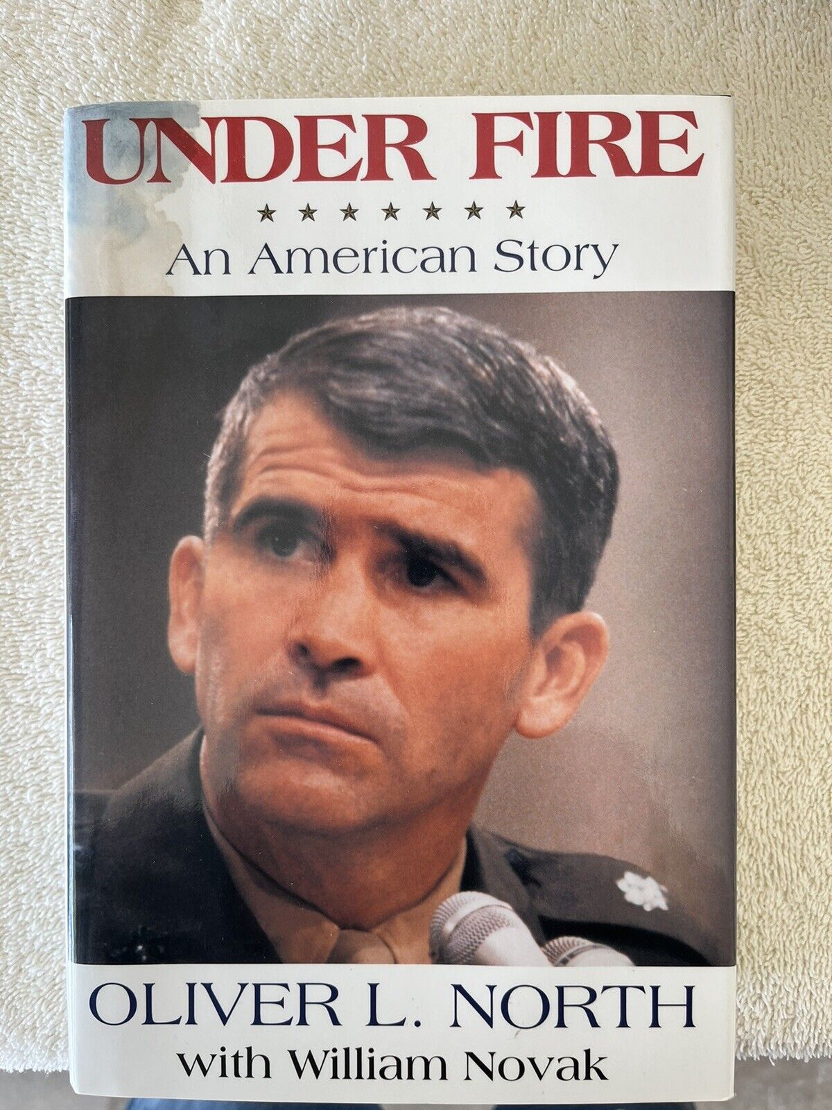 Oliver North signed Autobiography - Under Fire.   Excellent condition.