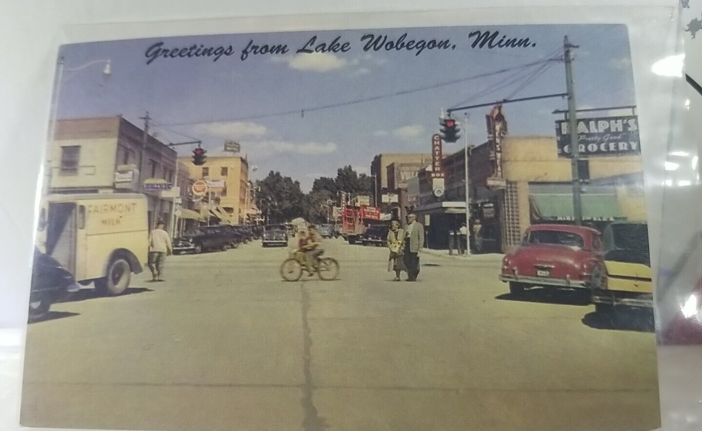 Main Street Scene Stores Old Cars Lake Wobegon Minnesota Vintage Postcard