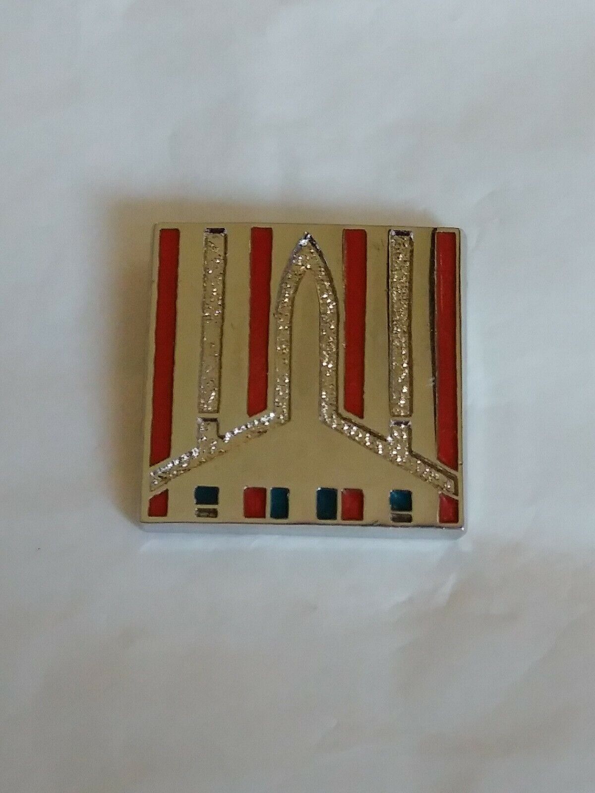 Unknown Company Logo Lapel Pin Red Blue & Silver Colored Rocket Airplane