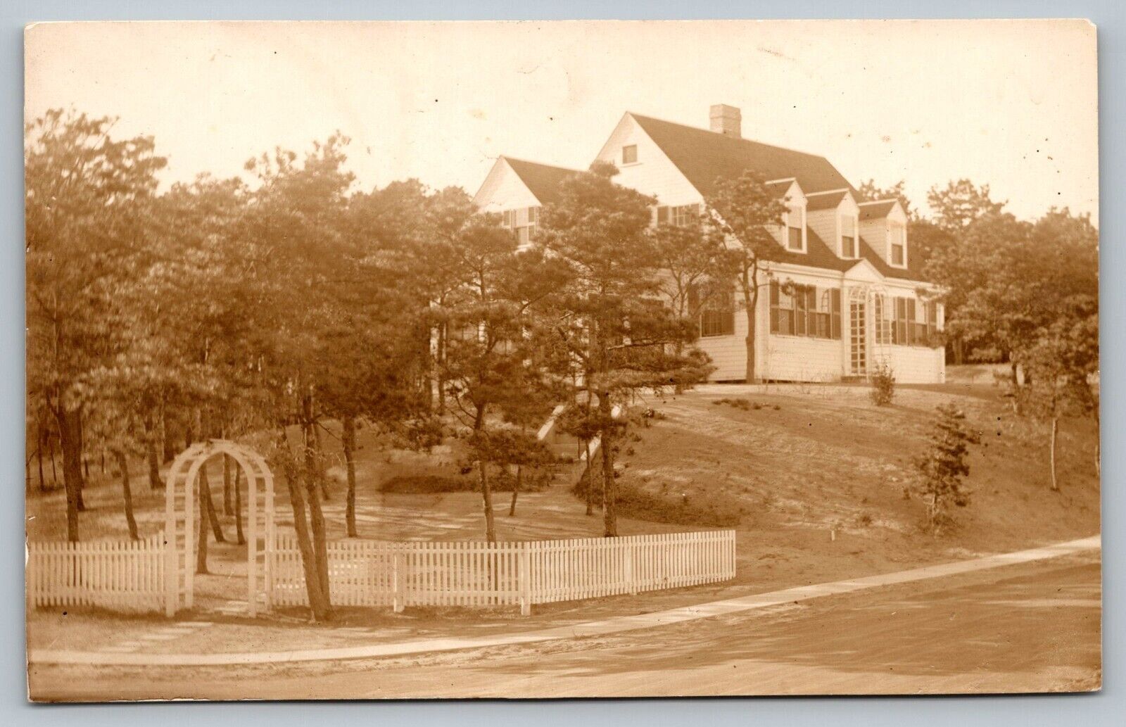 Postcard White Center Hall Colonial House on Hill Picket Fence Real Photo RPPC