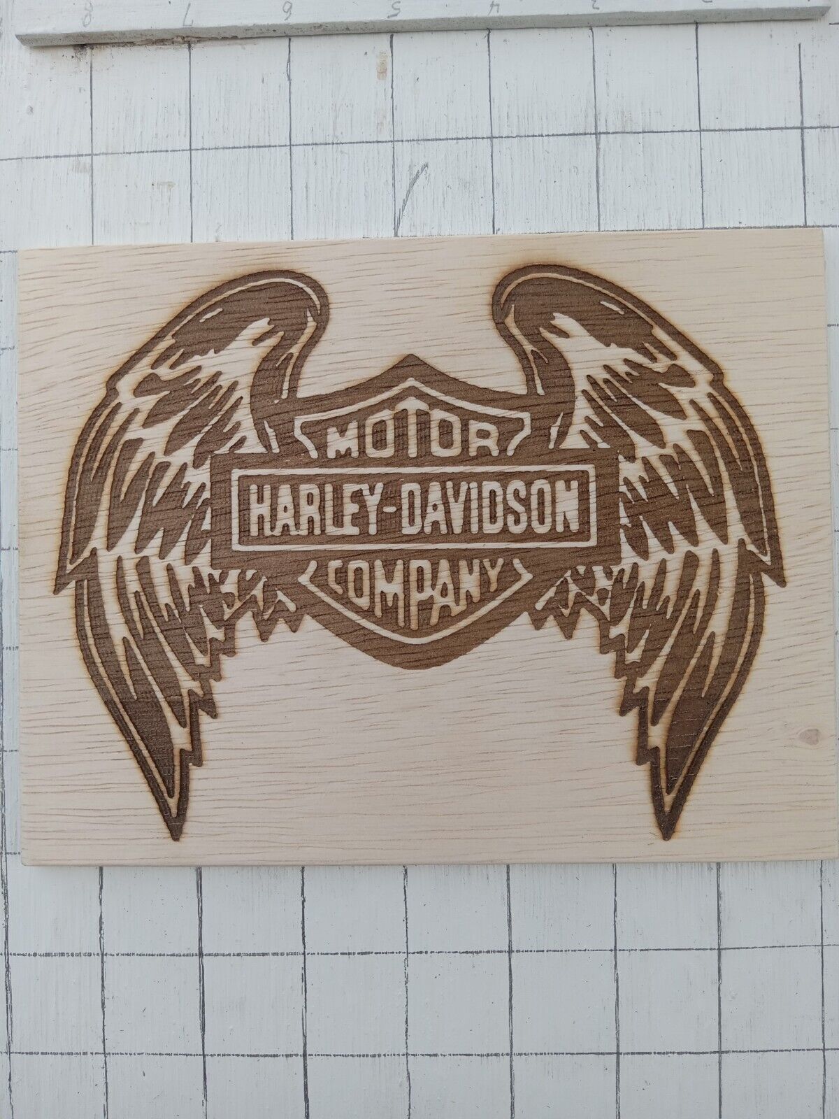 Harley Davidson laser engraved winged logo on wood 6x8x1/4 inch
