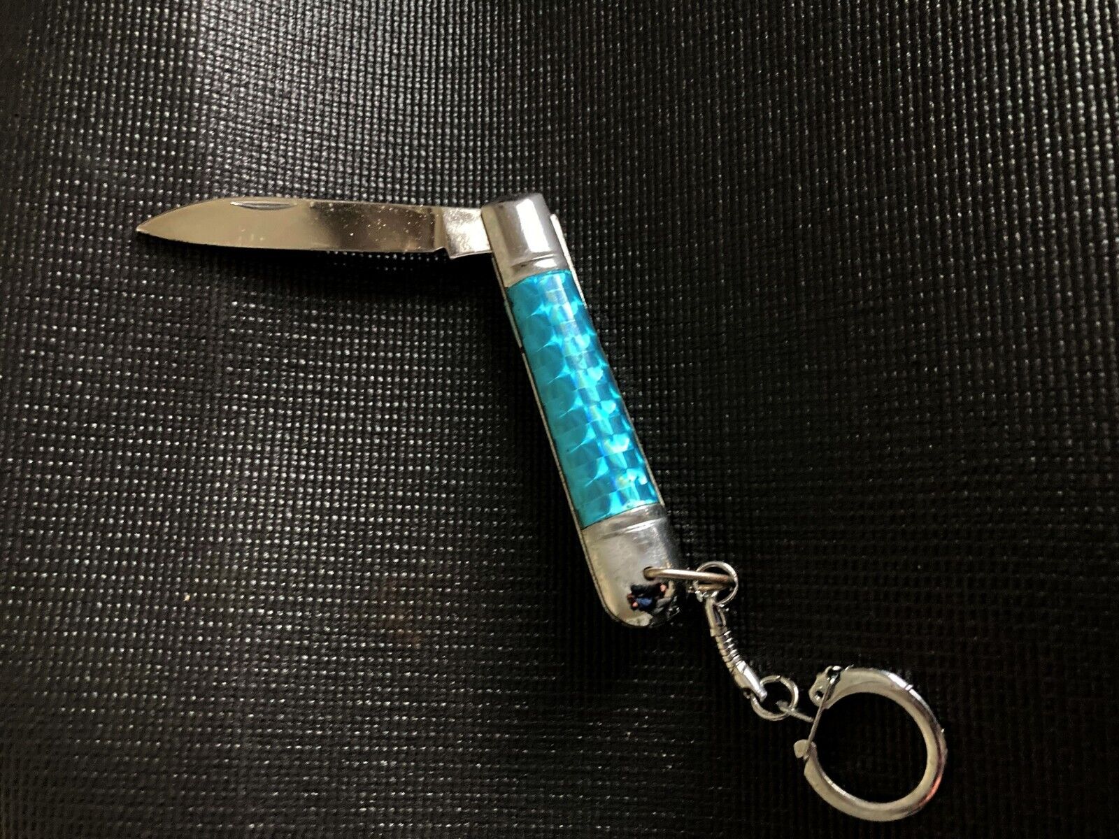 Stunning pocketknife irridescent turquoise color, 5-1/2\