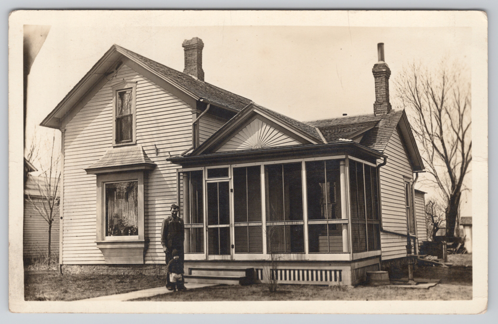 Real Photo Postcard Man and Child Standing in Front of House c1910 RPPC