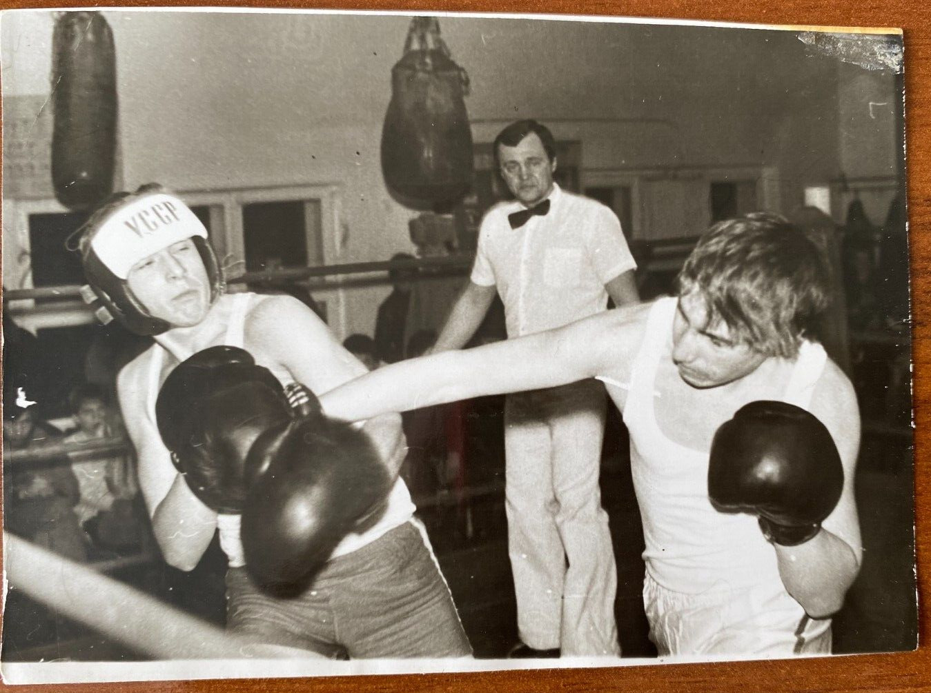 Beautiful guys boxing in competitions. Vintage photo