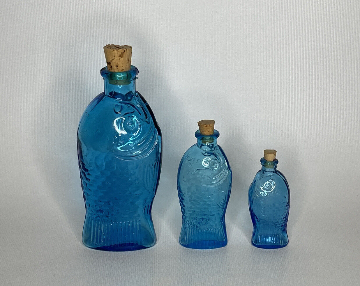 VTG Fisch\'s Bitters Three (3) Glass Bottles Blue Fish Taiwan Made Wheaton Style