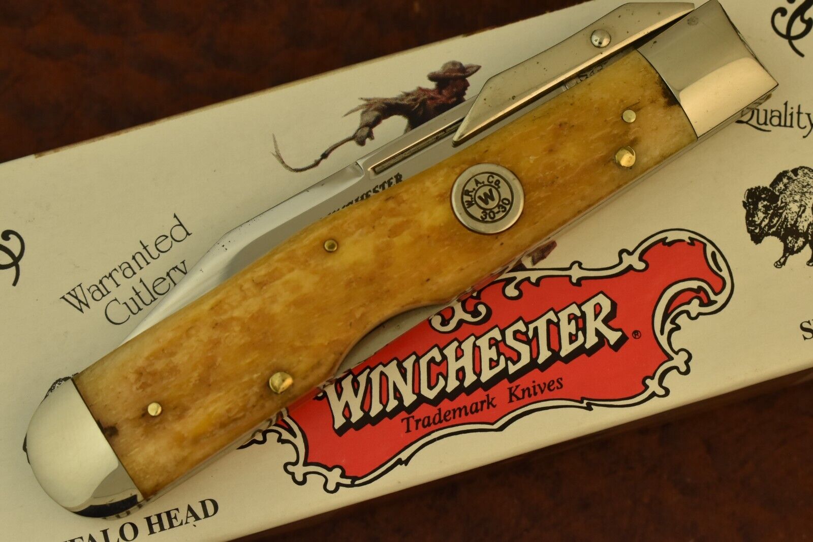 WINCHESTER TRADEMARK MADE IN USA BONE CHEETAH LOCKBACK SWING GUARD KNIFE (16664)