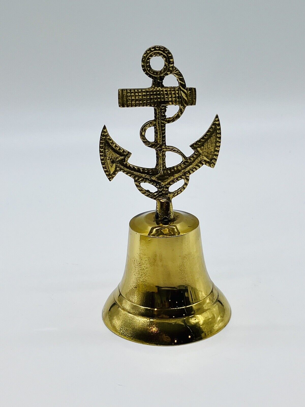 VINTAGE NAUTICAL METAL BELL WITH ANCHOR AND ROPE 7 INCHES TALL NAVY 