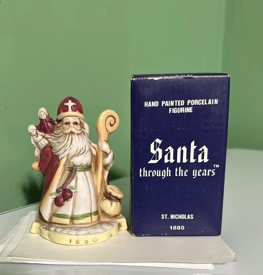 Santa Through the Years Porcelain Figurine 1880 St. Nicholas With Box