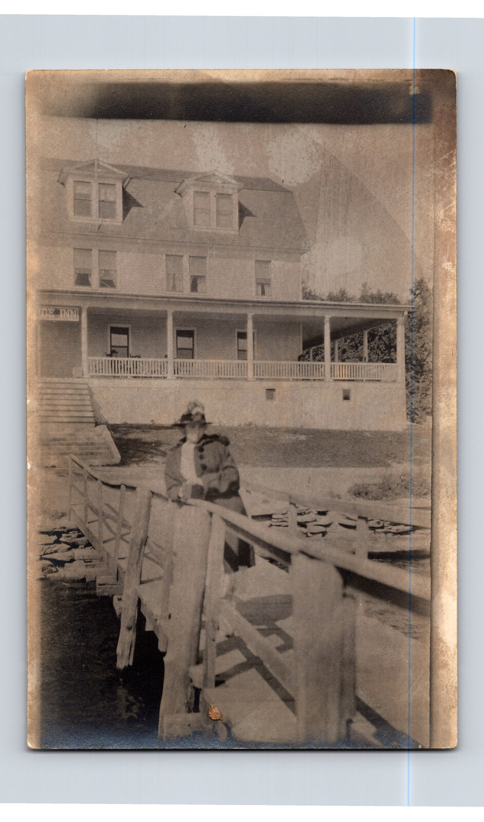 RPPC Woman at Dock of Large Waterfront Home Lodge Hotel Postcard