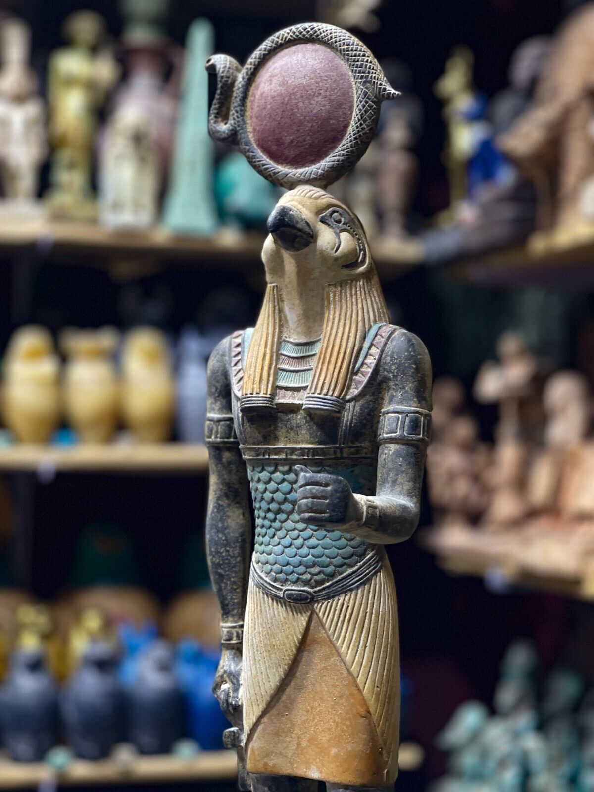 RA the god of sun wearing Sun disk with a falcon face - handmade in Egypt