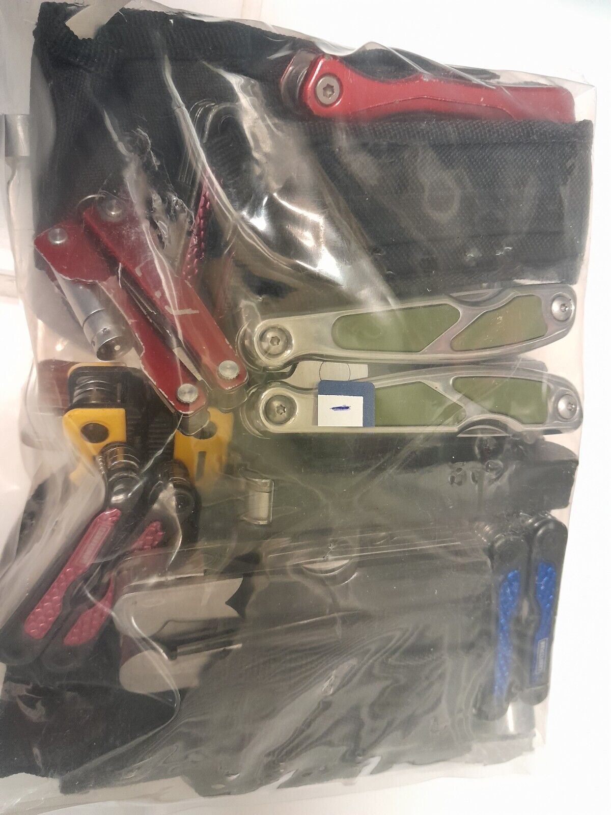 11lb Bag Of Assorted Multi Pocket Knives And Tools