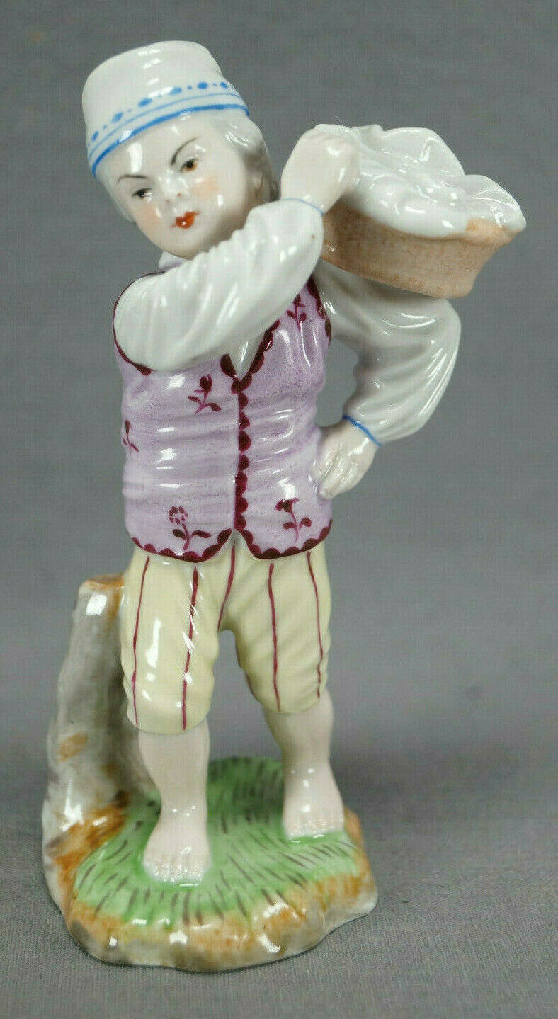 Early 20th Century Hochst Style Hand Painted Boy Carrying Basket Figurine