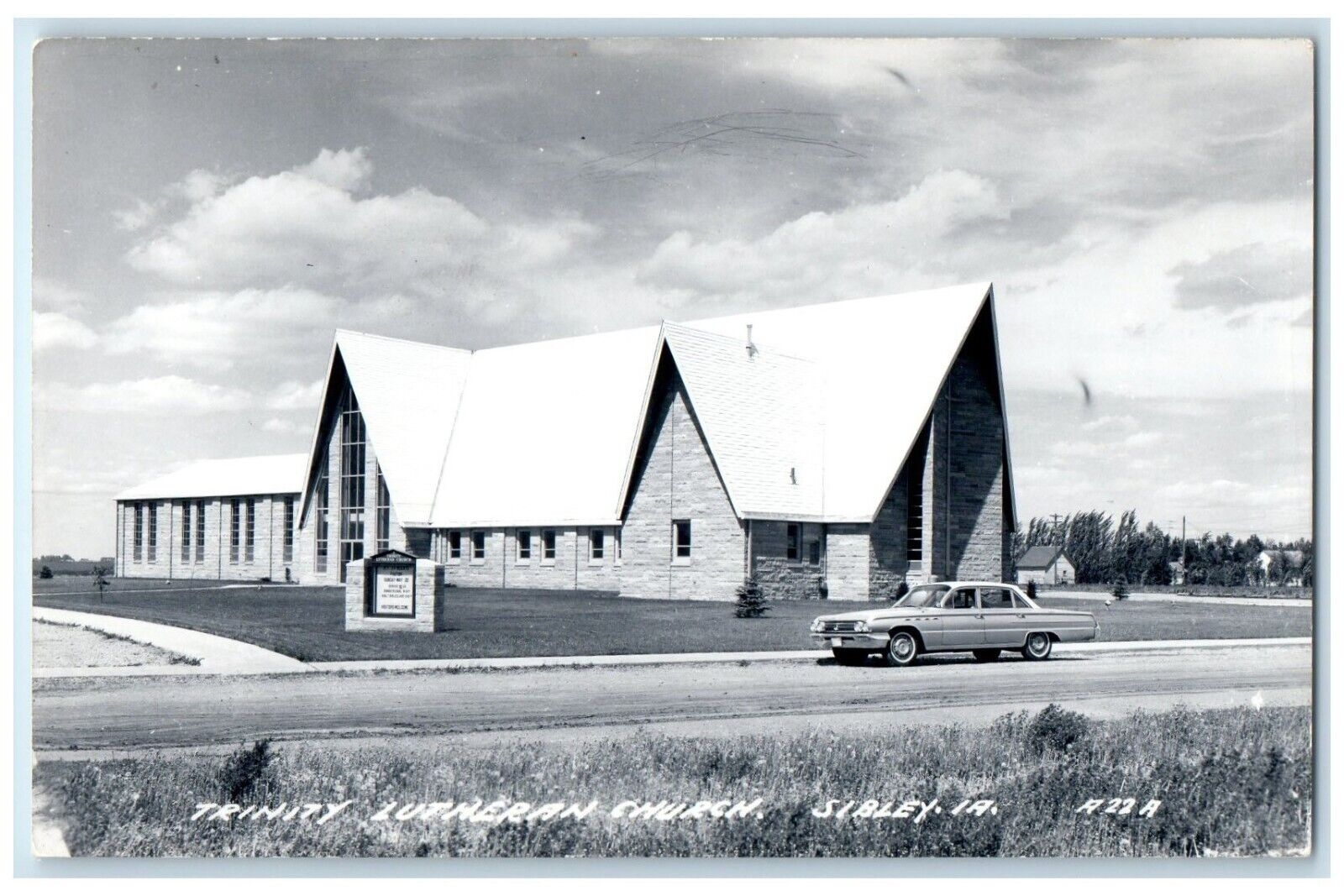 c1940's Trinity Lutheran Church Car Sibley Iowa IA RPPC Photo Vintage Postcard